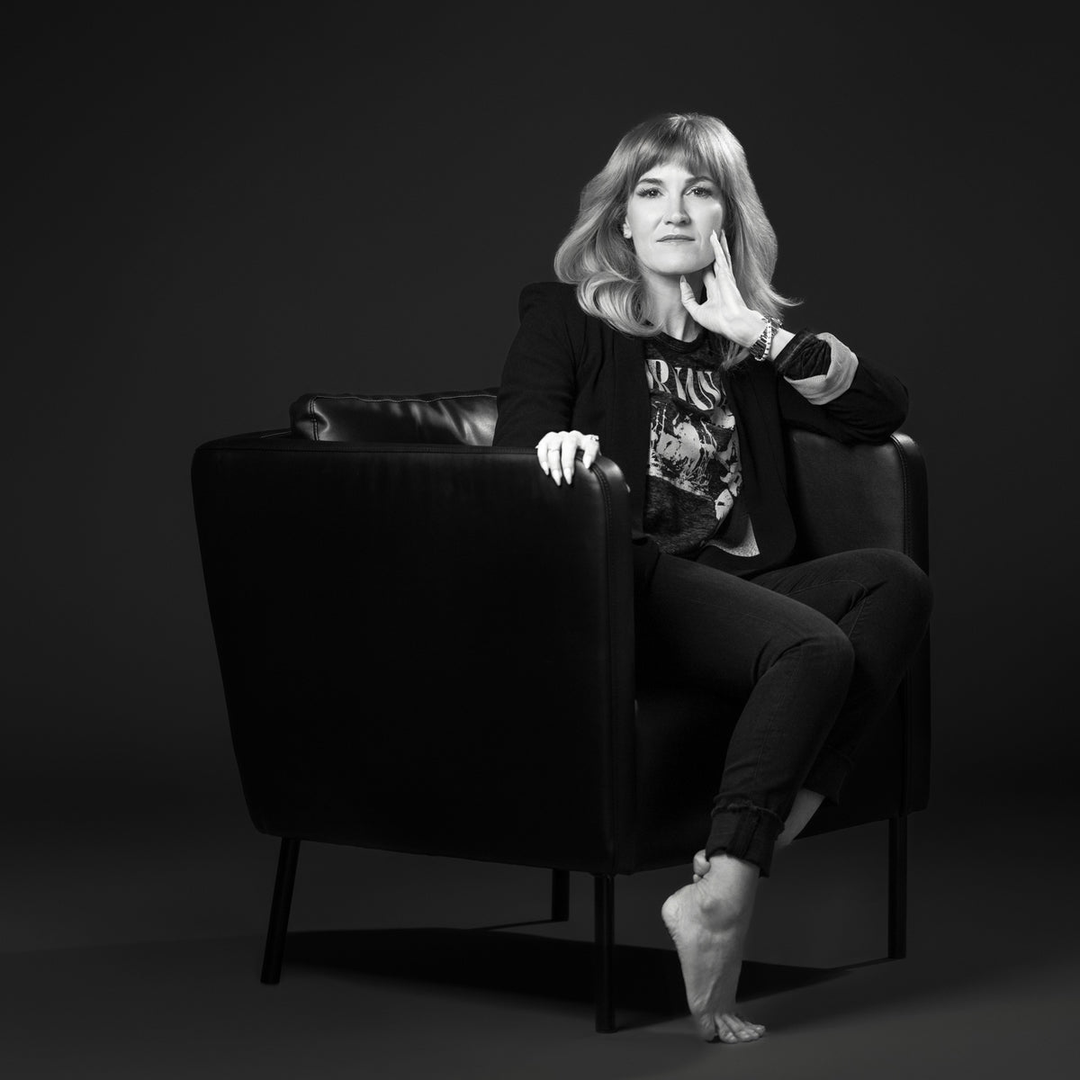 Kristin Day seated in an armchair